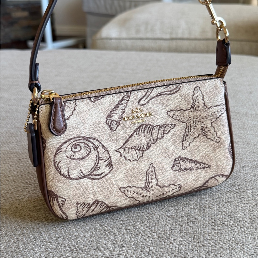 SOLD!!!Coach discontinued Seashell Print Bag